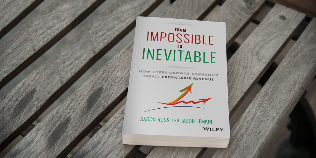 Image of From Impossible to Inevitable lying on a bench 