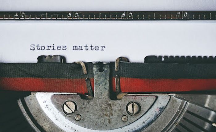 Typewriter typing out, "stories matter."